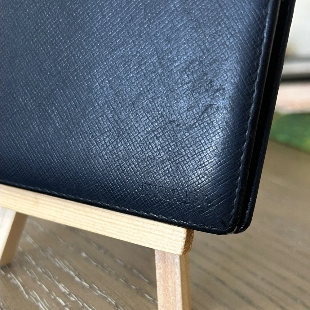 PRADA Embossed logo Saffiano leather bifold wallet Navy Model 224